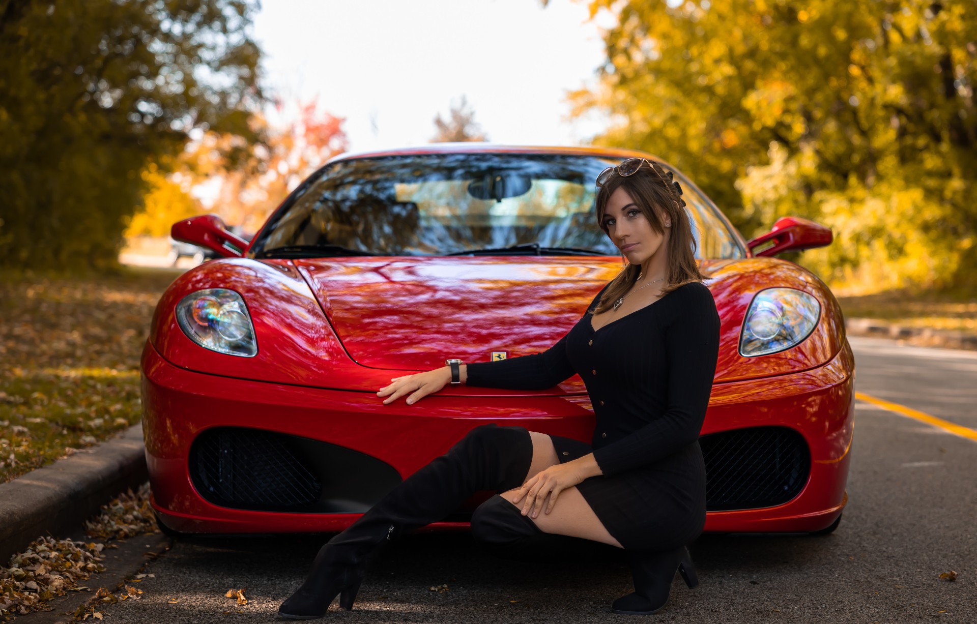 Autoagraphy detailing work with red Ferrari